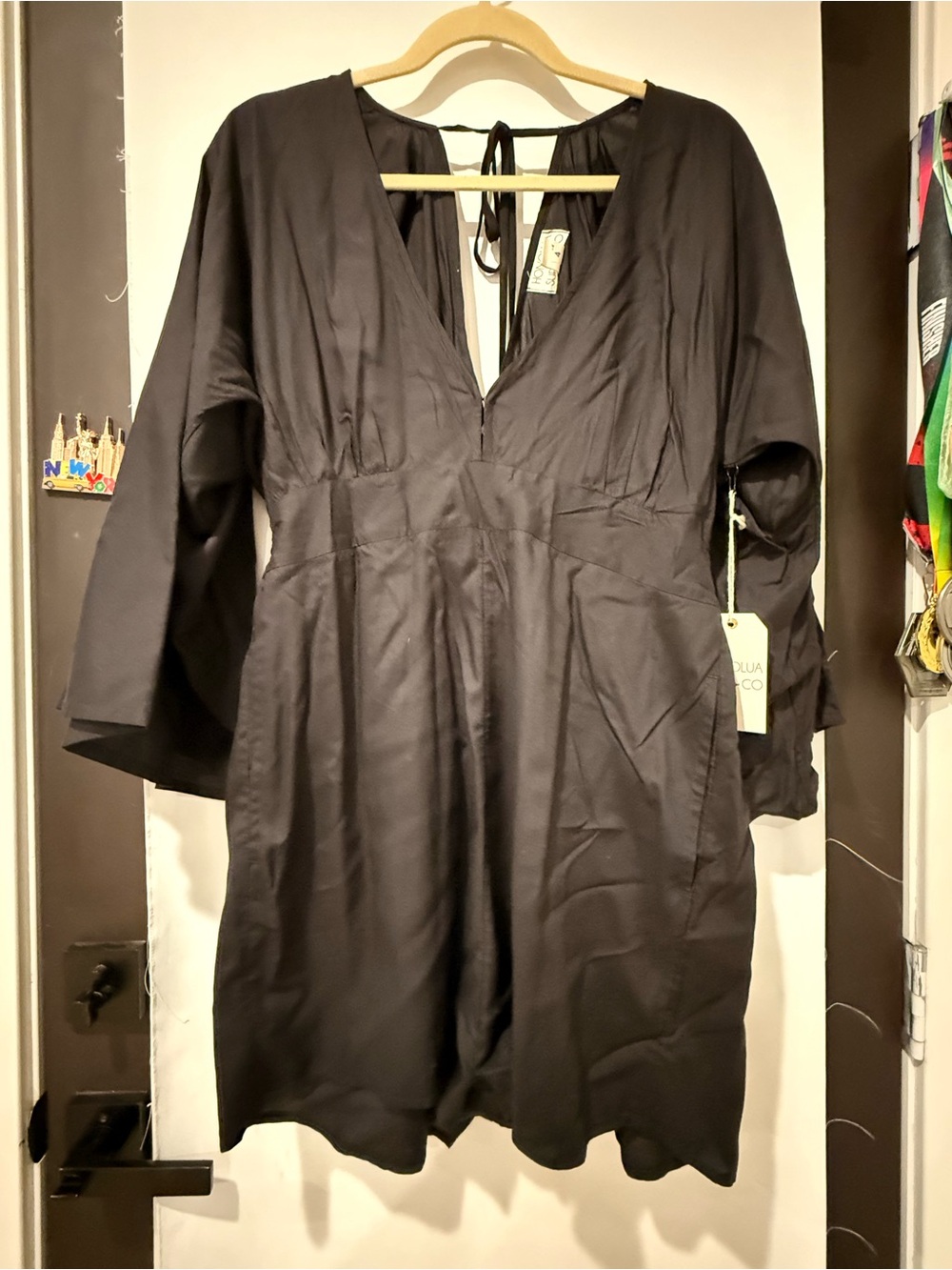 Deep V-Neck Black Jumpsuit with Tied Back